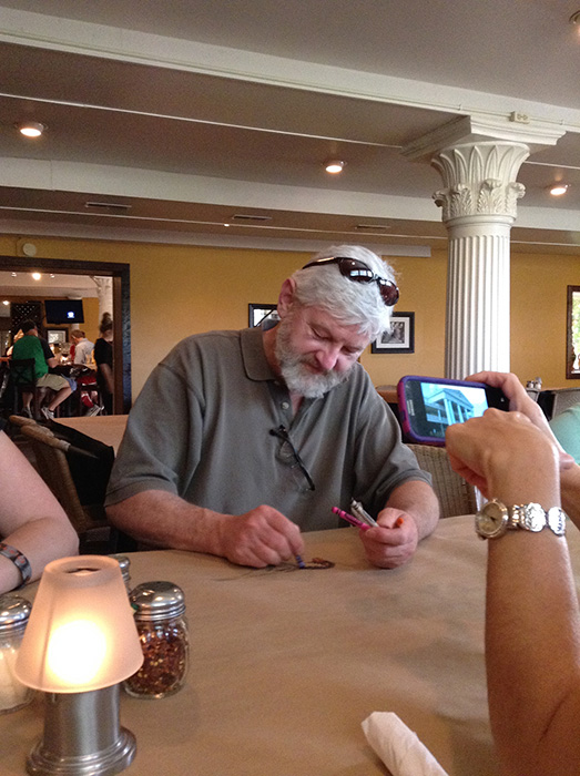 Ed Kelley entertains with crayon art.